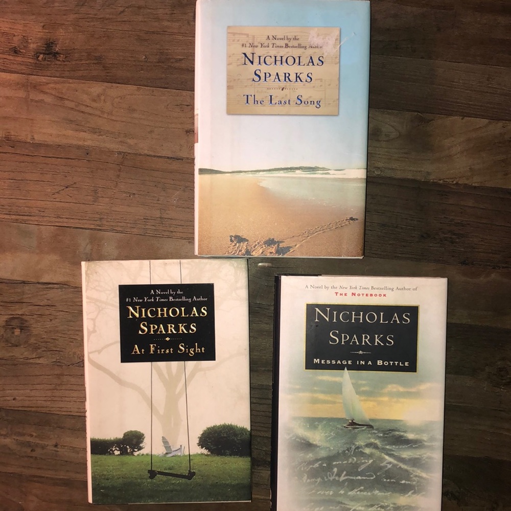 Three Hardcover Nicholas Sparks books.